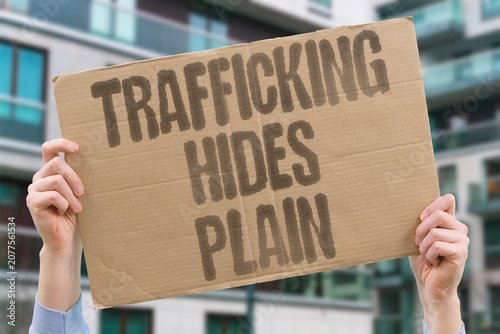 Obraz na płótnie "Trafficking hides plain" Modern slavery often occurs in plain sight