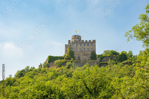 Pyrmont Castle. Germany. Burg Pyrmont.  Pyrmont Castle is enthroned on a mighty slate rock above a rushing waterfall on the Elzbach river.