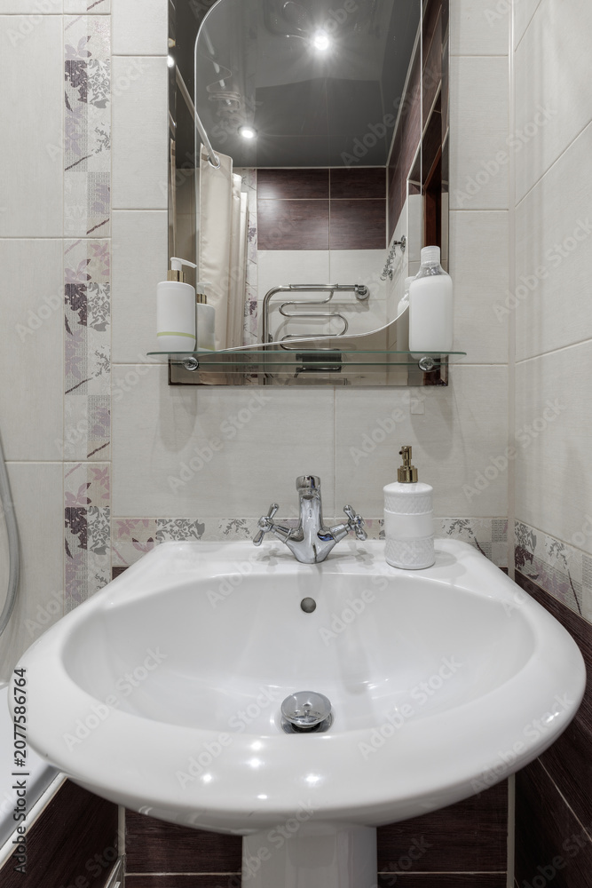 Fototapeta premium Bathroom Interior with Ceramic Washbasin Sink and Mirror close up
