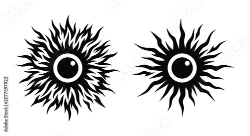 Photos Two stylized eye shapes with radiating lines presented as a black silhouette eye