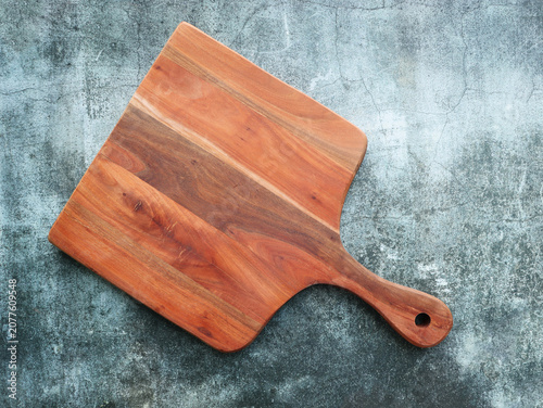 Wooden Cutting Board on Textured Surface