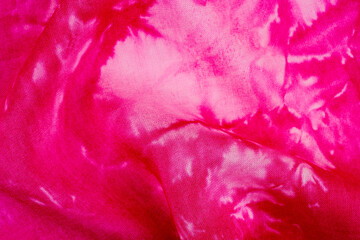 Close up of pink tie dye fabric texture