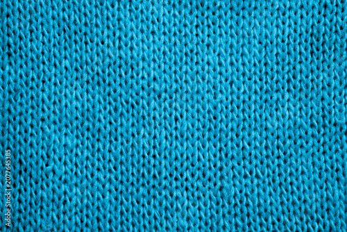 Photos Close-up of blue knit fabric texture