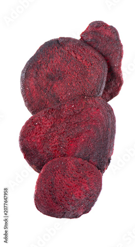 Crispy roasted beetroot chips with sea salt, isolated on white background. Healthy and crunchy natural vegetable snack. Clipping path.
