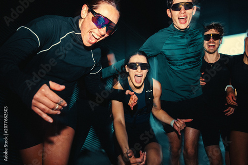 Running group training together with energetic young people in a run club