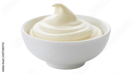 фотографія Creamy mayonnaise swirl in white bowl