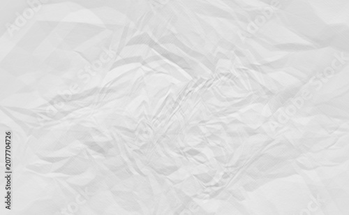 Crumpled paper texture with a monochromatic white and gray color scheme