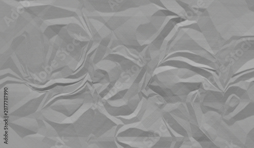 Crumpled paper texture with sharp folds a monochromatic grayscale background wrinkled