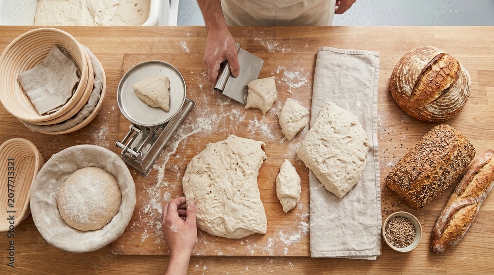 Fototapeta premium Morning bread loading scene in French bakery with warm oven glow