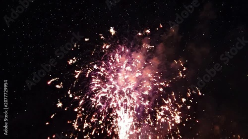 Vibrant purple fireworks bursting in night sky, festive celebration background, for new year, eve, independence day, and holiday events