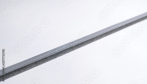 Closeup View of Metal Straight Edge Tool.