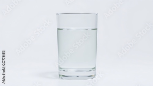 Clear water in a glass cylinder showing a concave surface.