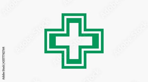 A simple green medical cross symbol isolated on a clean white background