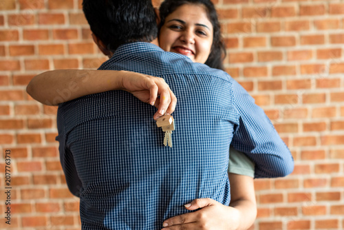 Photography Happy couple holding new keys