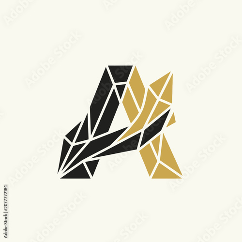 A geometric letter design featuring sharp angles and a dual color scheme