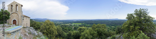 Chapel  'Our Lady of la Roque' overlooking the southern promontory of Moissac-Bellevue in Provence (Var). Magnificent view on hills and Maures massif up to the Sainte Baume with a viewpoint indicator

