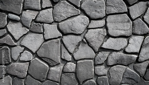weathered rustic grey stone patterned stamped concrete texture featuring irregular shapes and subtle shading for industrial or modern design
