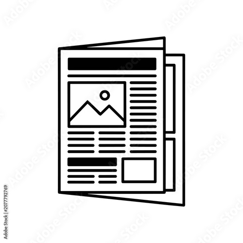 Newspaper with a photo inside.