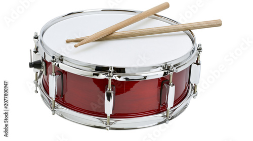 Принти на полотні Red snare drum with wooden drumsticks on white surface