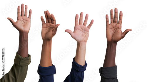 Fotografie Four diverse hands raised upwards, showing different skin tones and clothing