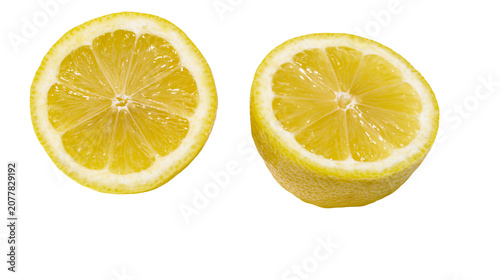 Fotografía Two fresh yellow lemon halves showing juicy pulp and white pith