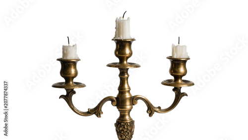 Fotografija Antique brass candelabra with three unlit white candles, isolated on transparent