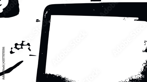 Close-up of a tablet screen with abstract black and white graphic elements