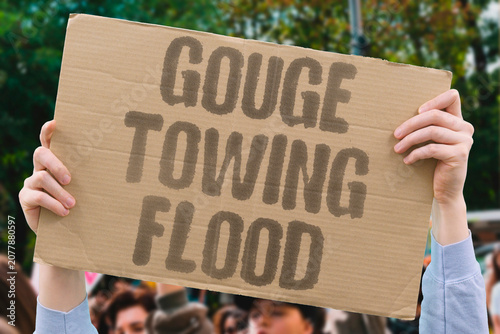 Obraz na plátne "Gouge towing flood" Vehicle recovery fees surge after disasters