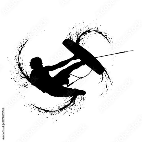Obraz na płótnie Black silhouette of a kitesurfer performing a jump with a kiteboard, surrounded