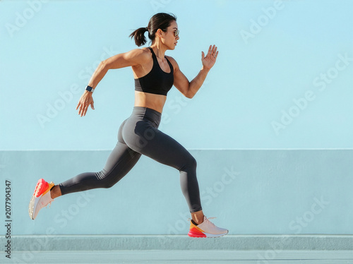 Fit woman running.