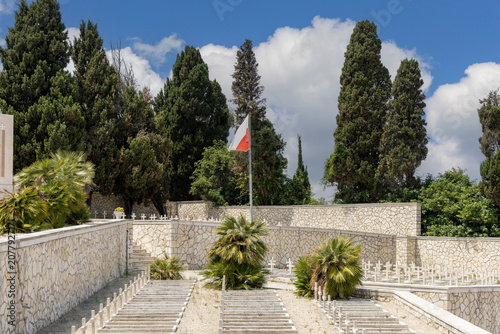Polish War Cemetery in Loreto, WWII burial site of soldiers, rows of graves, Loreto, Italy