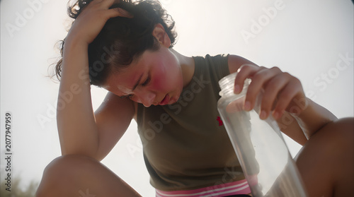 Woman Experiencing Dehydration During Heatwave