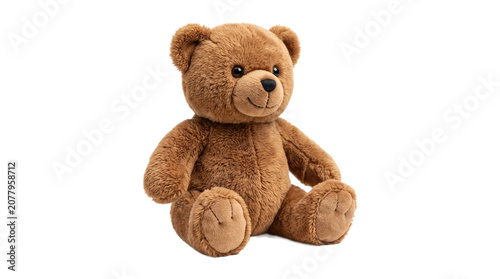 Photos A soft brown teddy bear sits patiently, emanating warmth and comfort, a classic representation of childhood and tender companionship