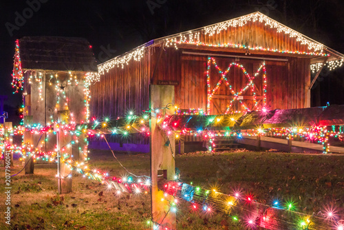 christmas tree lights on barn
