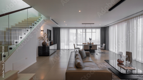 Modern office space with glass walls and conference table