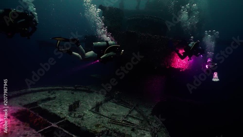 Scuba Divers Swimming Over Gun Mount on Sunken USS Oriskany Aircraft Carrier