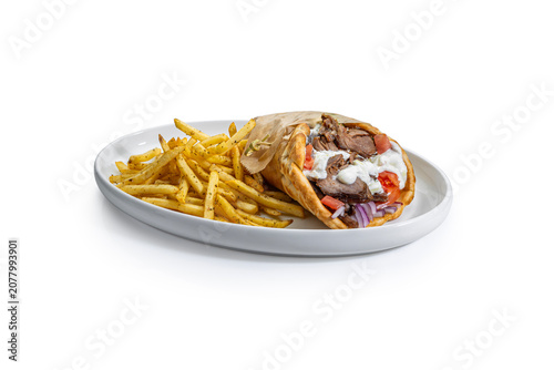 Принти на полотні Traditional Greek Lamb Gyro Wrap with Seasoned French Fries on White Background