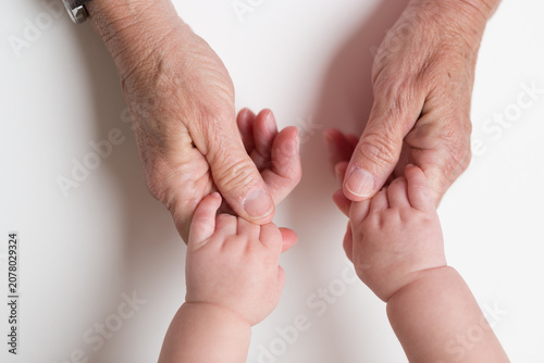Bild auf Leinwand mother and baby hands