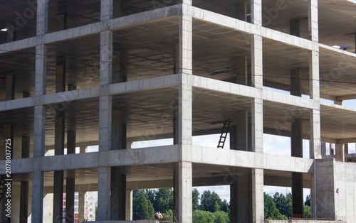Authentic concrete structure, slab building. Reinforced concrete construction. Industrial concrete structure. Construction site.