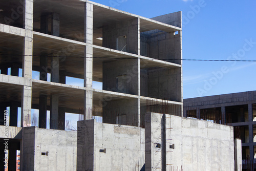 Authentic concrete structure, slab building. Reinforced concrete construction. Industrial concrete structure. Construction site.