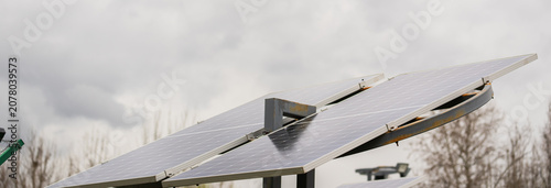 Obraz na płótnie Solar power system with photovoltaic panels converting sunlight into renewable e
