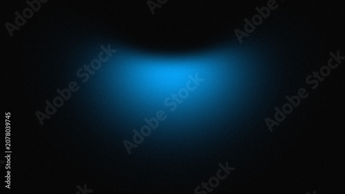 Фотография Abstract blue light glow on black background, soft neon spotlight effect, dark c