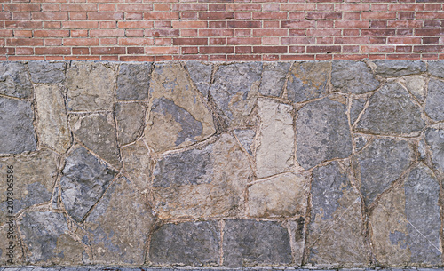 Natural stone wall texture with brick finish background surface design