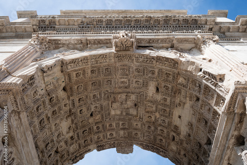 Fotografie Detailed low angle view of the decorated coffered ceiling inside the ancient Rom