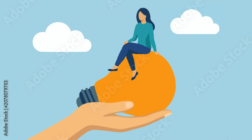 Obraz na plátně Woman on giant lightbulb held by hand, symbolizing new ideas and inspiration