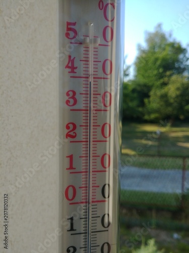 Record high temperature on thermometer in shade outside window in June in southern Poland in 2026. 39 degrees Celsius during inflow of tropical air. Topics: weather anomalies, heat, summer, season