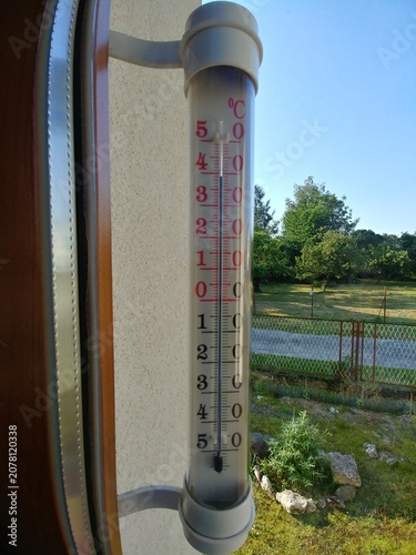Record high temperature on thermometer in shade outside window in June in southern Poland in 2026. 39 degrees Celsius during inflow of tropical air. Topics: weather anomalies, heat, summer, season