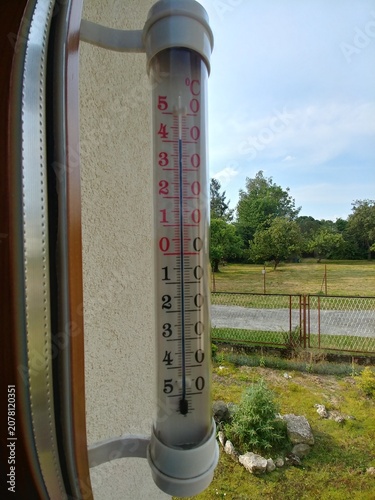 Record high temperature on thermometer in shade outside window in June in southern Poland in 2026. 40 degrees Celsius during inflow of tropical air. Topics: weather anomalies, heat, summer, season