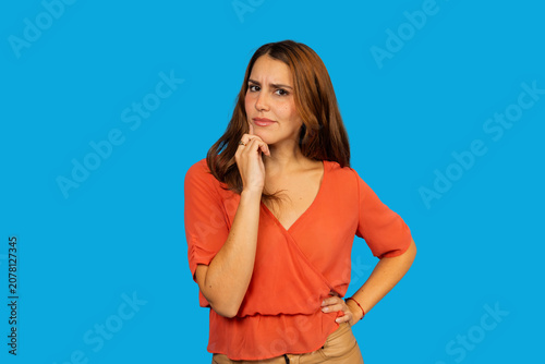 Photography Woman thinking, having doubt, questioning decision