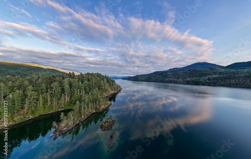 Aerial View of Harrison Lake Surrounded by Forested Mountains and Calm Reflections in British Columbia